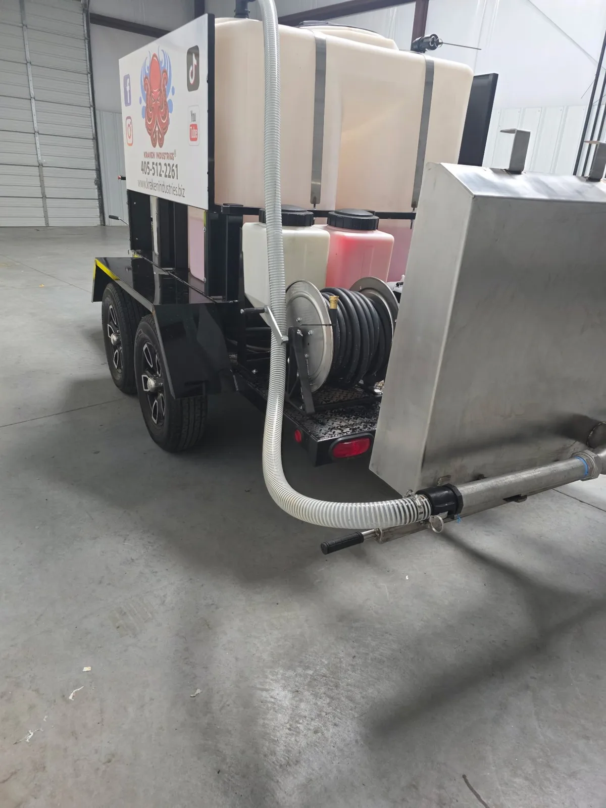 Kraken Trailer Combo Double — rear angle with tank and hose reels